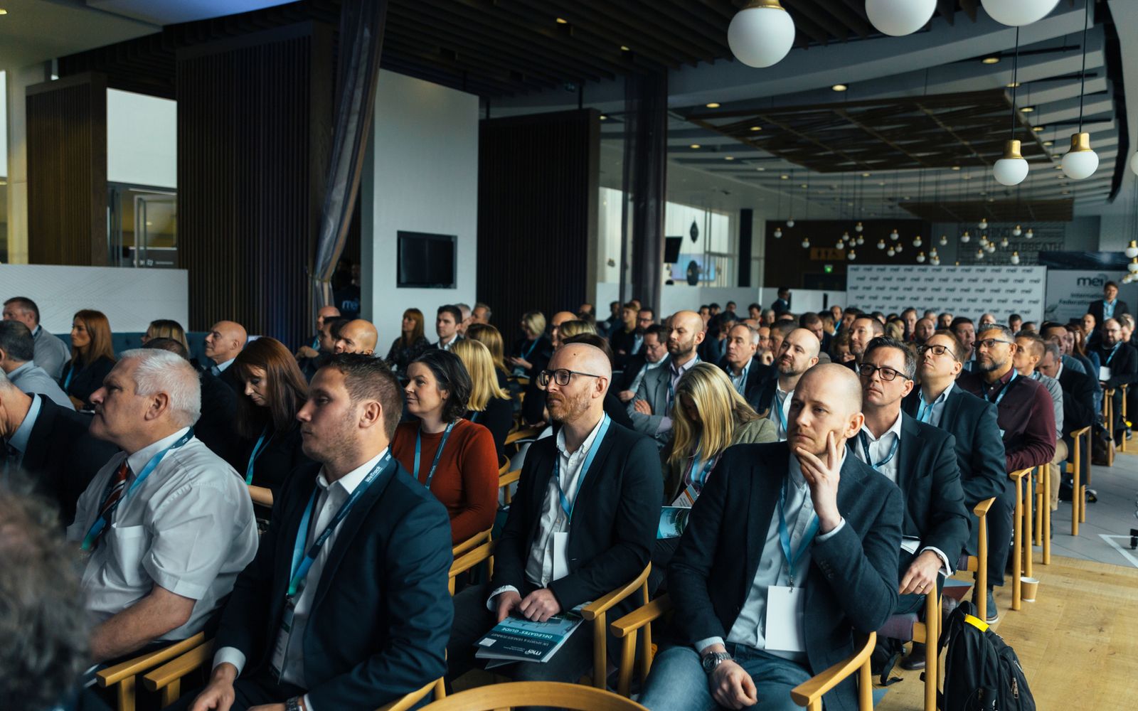 Audience seated at a corporate conference